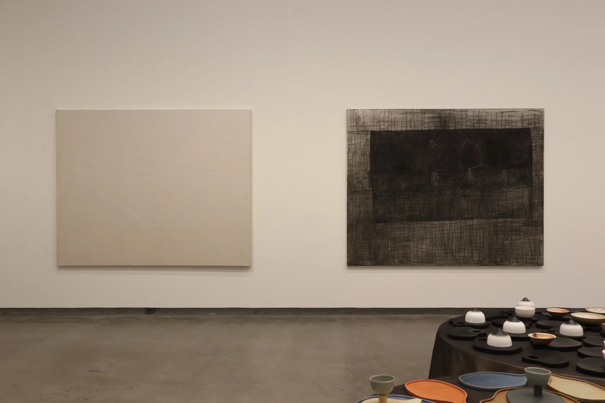 Pinaree Sanpitak, Balancing Line, 2009. Acrylic on canvas, 200 x 250 cm. and  Rooting, 2009. Paper, acrylic, pastel on canvas
, 201 x 250 cm. Photo: Aroon Peampoonsopon . Courtesy of the Jim Thompson Art Center and the James H.W. Thompson Foundation © Jim Thompson Art Center