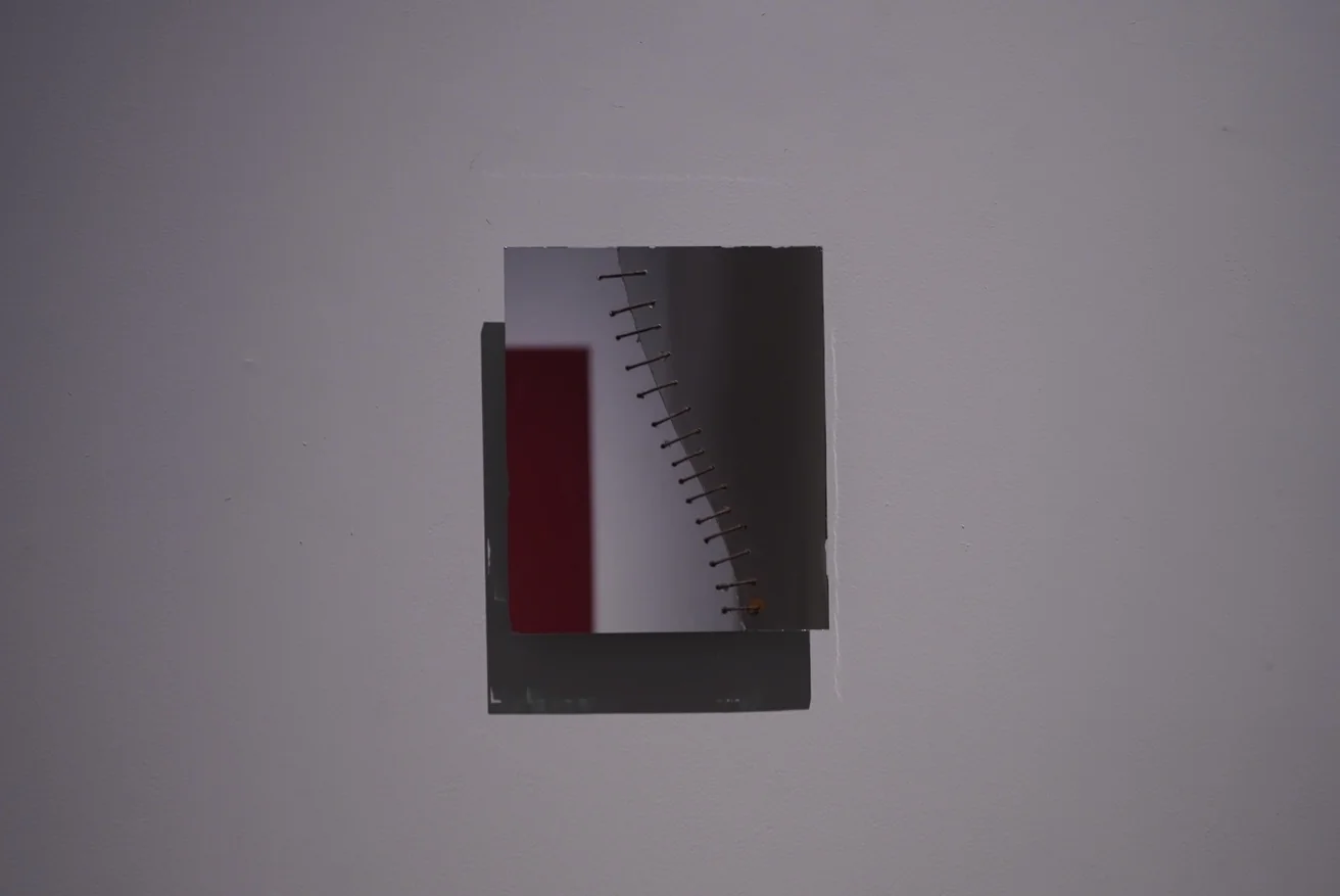 Kader Attia, Untitled (Mirrors), 2024. Black canvas, 124 x 140 cm.. Photo: Swita Uancharoenkul. Courtesy of the Jim Thompson Art Center and the James H.W. Thompson Foundation © Jim Thompson Art Center