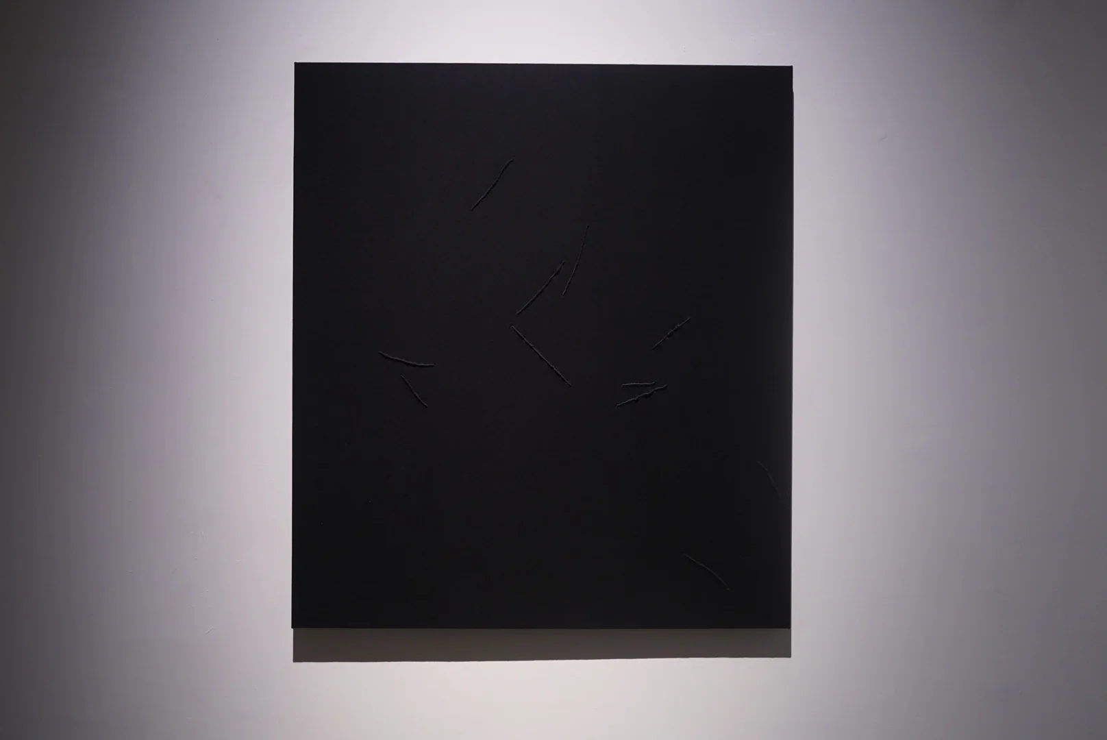 Kader Attia, Untitled (Mirrors), 2024, Black canvas: 124 x 140 cm. Photo Credit: Swita Uancharoenkul