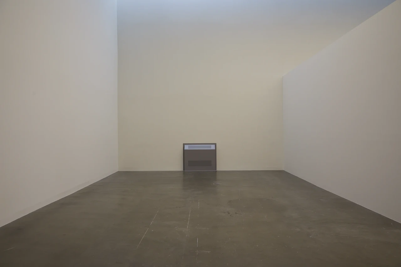 Sung Tieu, Protective Cover, (Headache), 2022. ound installation, polyester powder coated steel wall mounted cover, tamper resistant screws, speaker, 90 x 110 x 20 cm 35 3/8 x 43 1/4 x 7 7/8 inches sound: continuous loop. . Photo: Thakueng Withusuwan. Courtesy of the Jim Thompson Art Center and the James H.W. Thompson Foundation © Jim Thompson Art Center