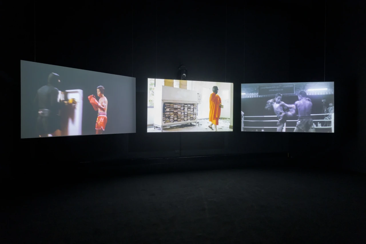 Chulayarnnon Siriphol with Jean Sit Arjan Jo Collective, and Kasamaponn Saengsuratham (Thailand),Red Eagle Sangmorakot: No More Hero in His Story, 2024. Installation view at Bangkok Art and Culture Centre. Photo by BACC