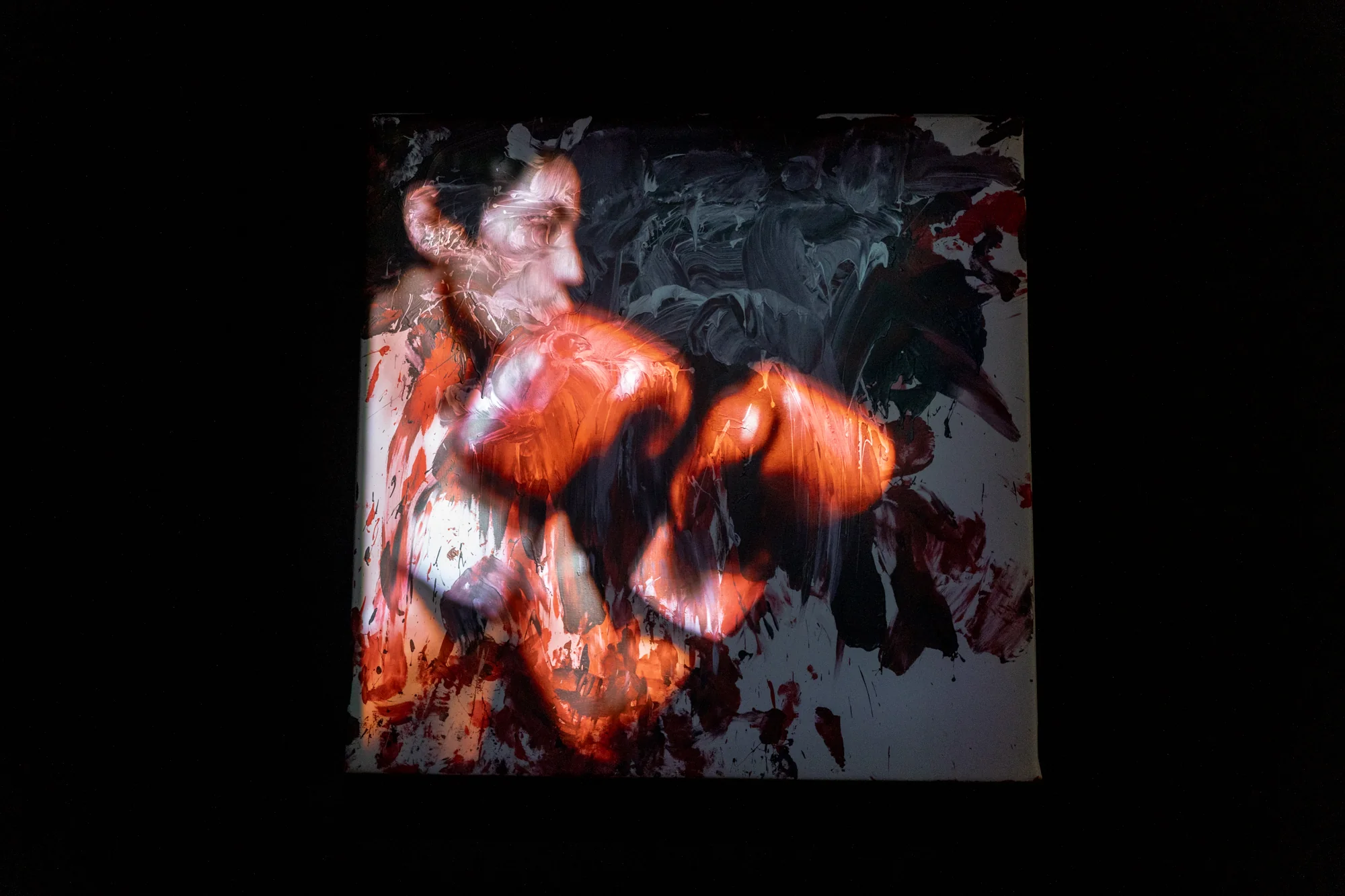 Chulayarnnon Siriphol  with Jean Sit Arjan Jo  Collective, and  Kasamaponn Saengsuratham, Red Eagle Sangmorakot: Action painting, 2024. Single channel video, 5 min. Acrylic on canvas, 120 x 120 cm. Photo: BACC. Courtesy of BACC © BACC